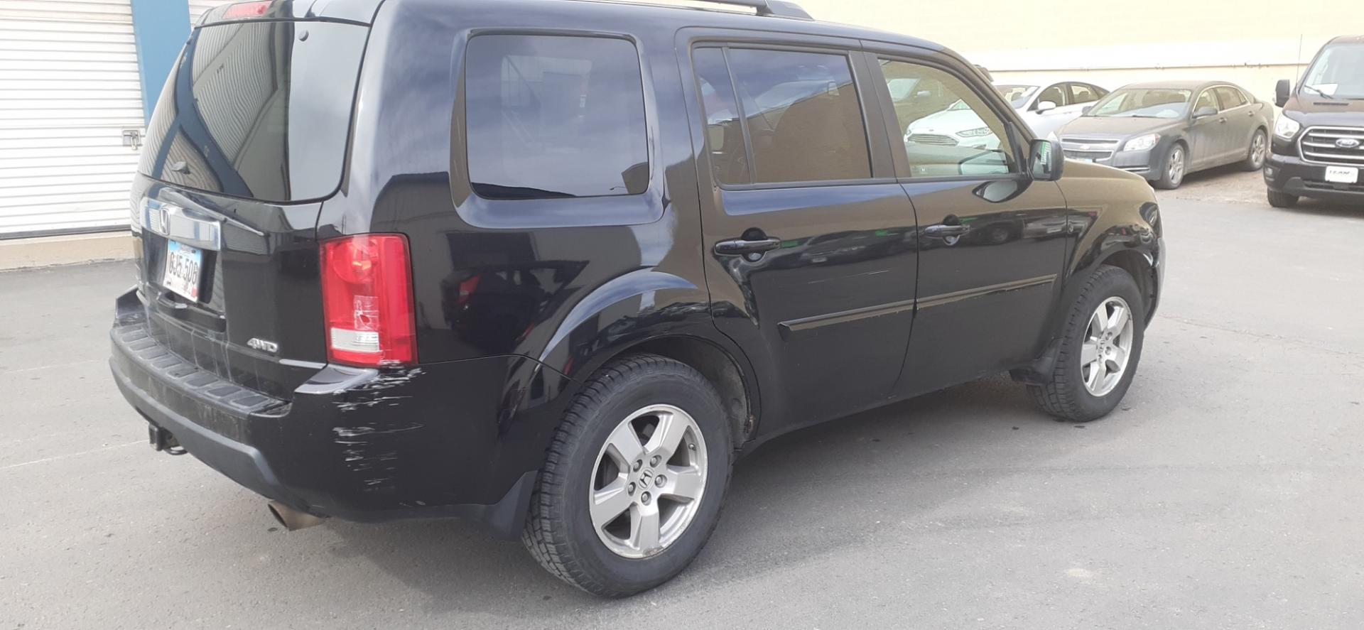 2011 Honda Pilot EX-L 4WD 5-Spd AT (5FNYF4H55BB) with an 3.5L V6 SOHC 24V engine, 5-Speed Automatic transmission, located at 2015 Cambell Street, Rapid City, SD, 57701, (605) 342-8326, 44.066433, -103.191772 - CARFAX AVAILABLE - Photo#2